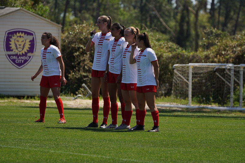 The Flagler College women's soccer team establishes a wall during a March 14, 2021 friendly with the Orlando Pride.
